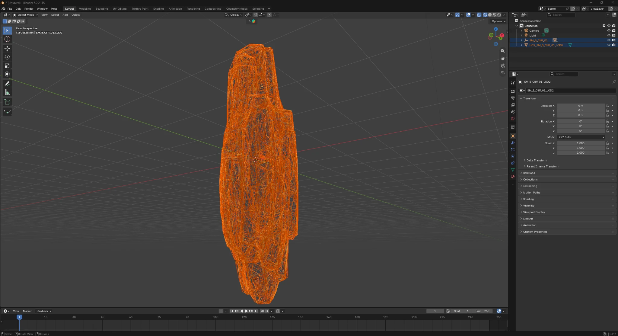 An orange wireframe view of a cliff mesh in Blender